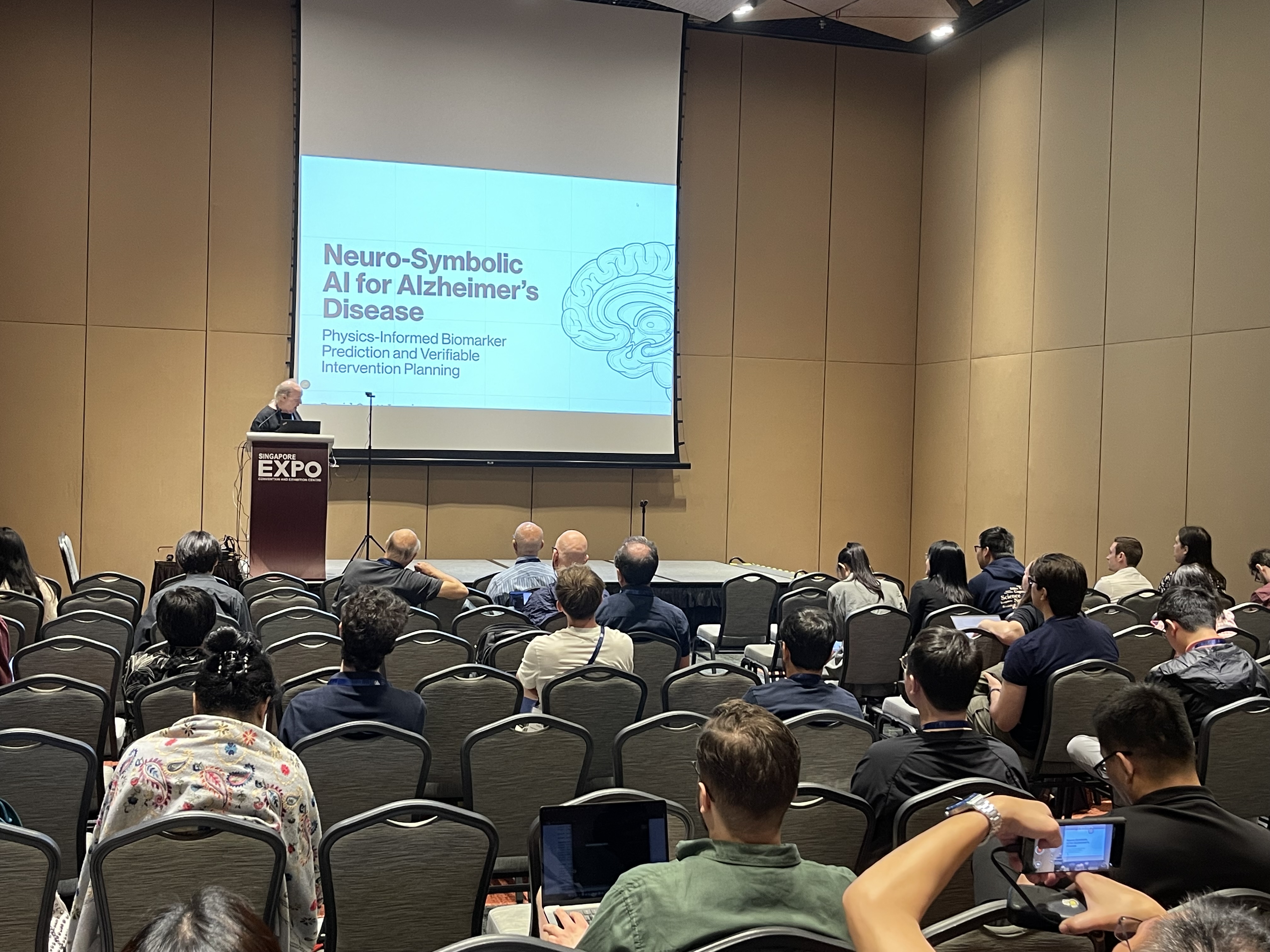 David Scott Lewis presenting oral at AAAI-26